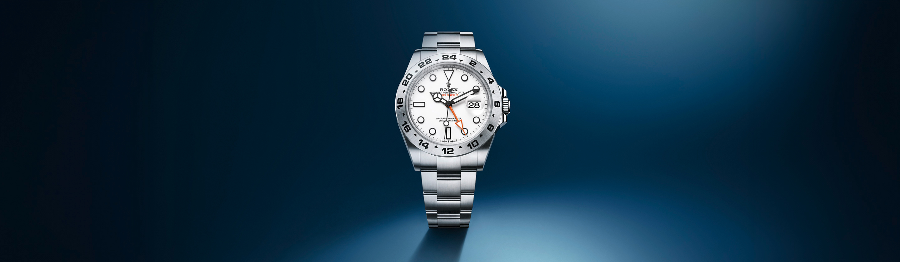Banner der Rolex Explorer mit weißem Zifferblatt und Edelstahl Oystersteel