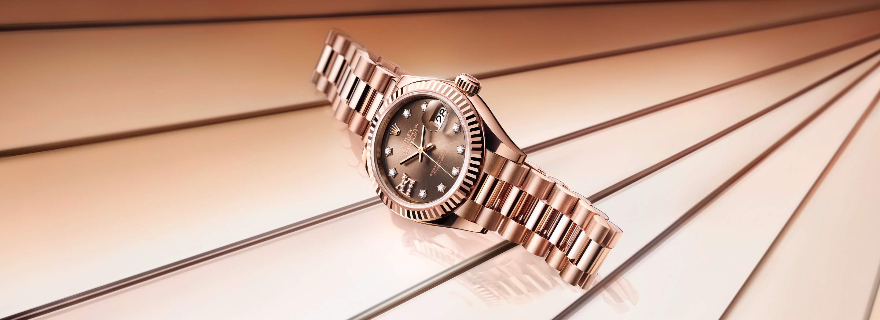Die Rolex Lady-Datejust in Everose-Gold und schokoladenfarbenem Zifferblatt mit Diamanten