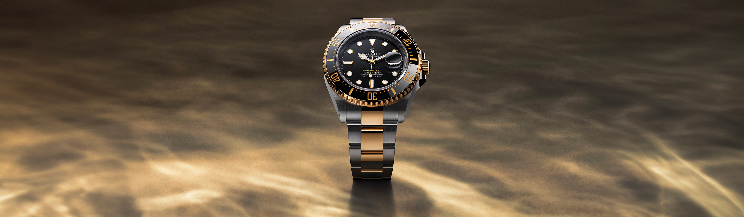 Die Rolex Sea-Dweller M124060-0001 in Edelstahl Oystersteel und Gelbgold